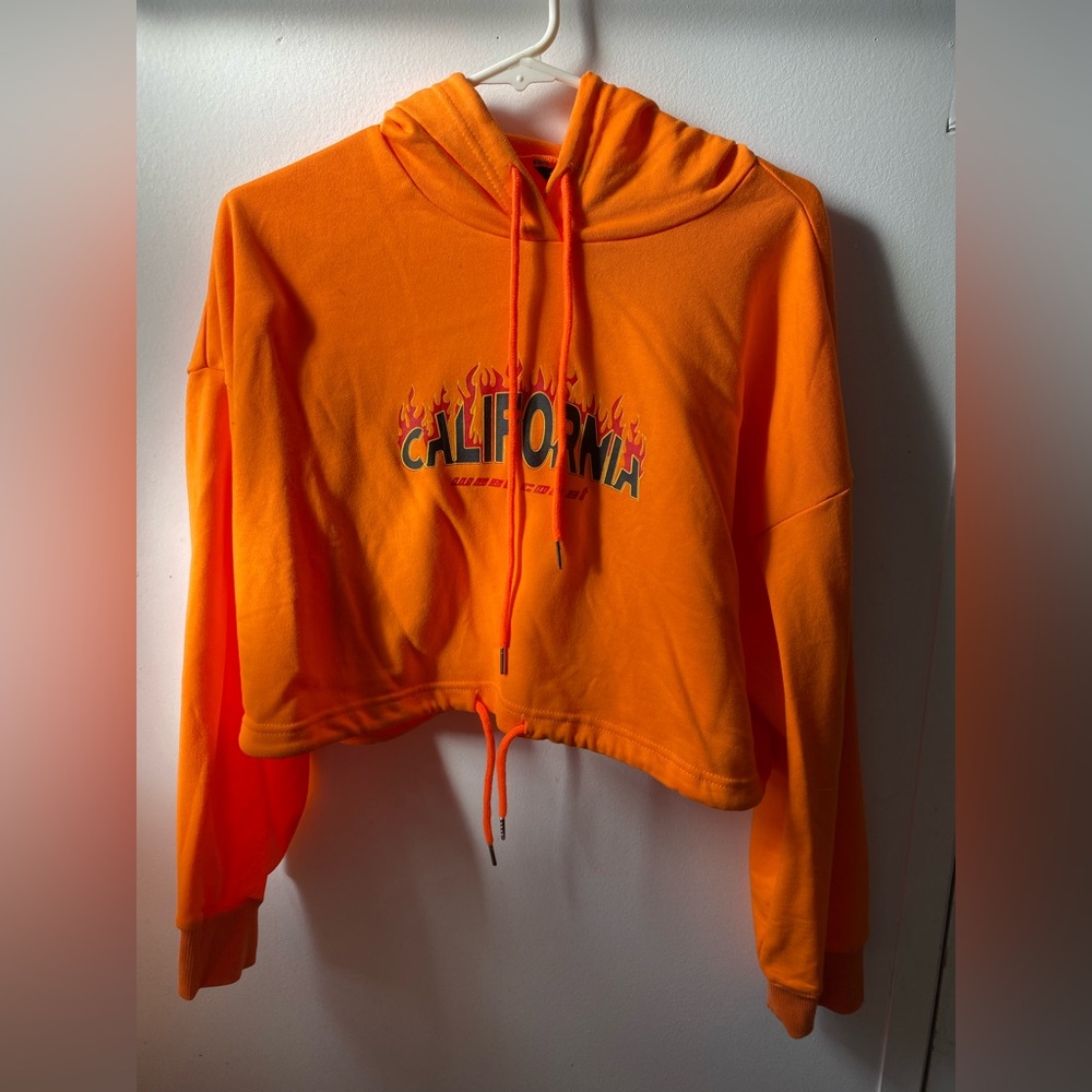 Cropped orange sweater